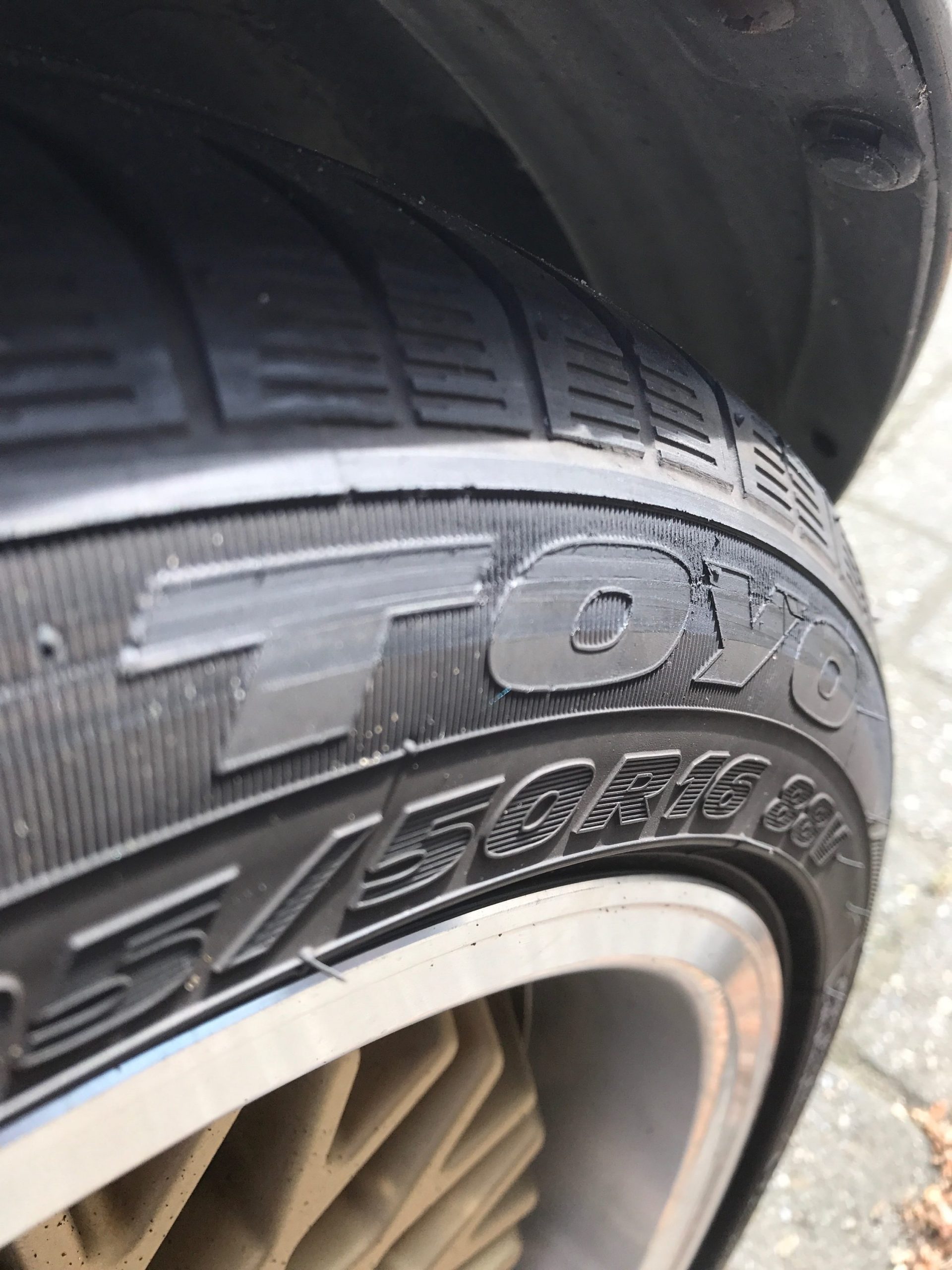 closeup of damaged tyre wall