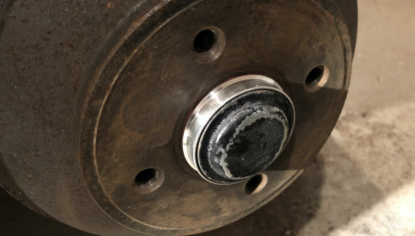 closeup of rear axle with spigot ring mounted