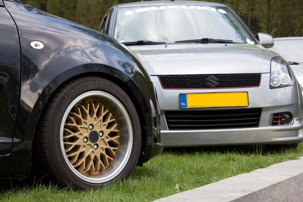 Closeup of golden Abarth wheel on Suzuki Swift 