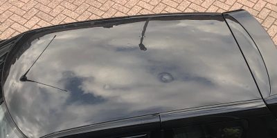 closeup of dented roof