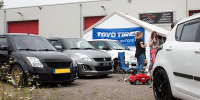 picture of swifts parked together at a car show