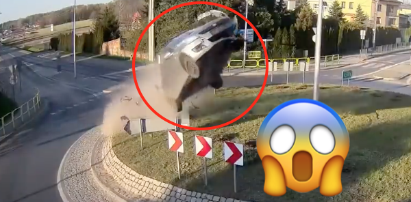 Suzuki Swift flies over roundabout